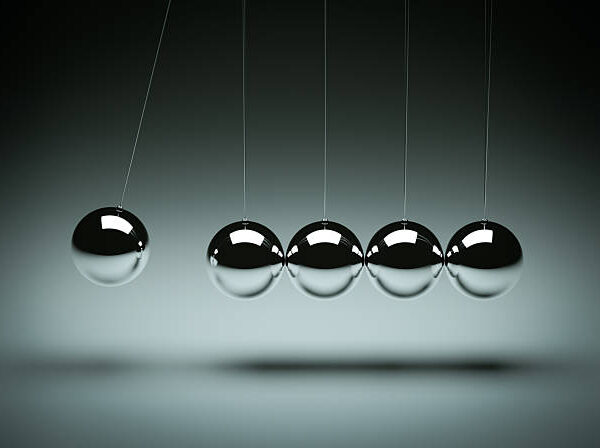 "Balancing balls Newton's cradle, clean studio shotVector versions:"